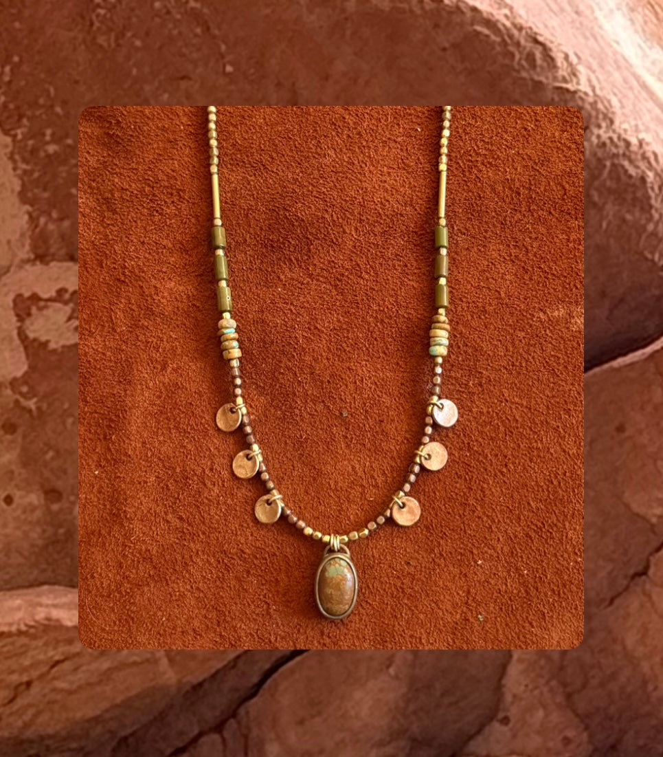 Sediment swirl necklace